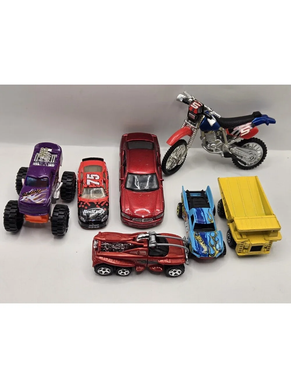 Mixed Toy Vehicle Lot of 7 Monster Truck Dirt Bike Dump Truck Race Cars Diecast